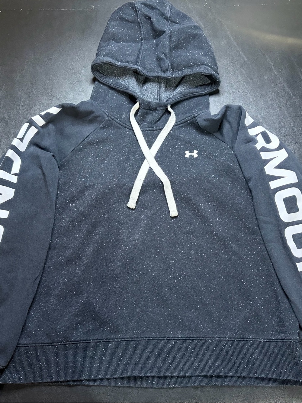Black Under Armour Medium Speckled Hoodie with White Sleeve Branding
